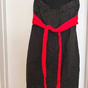 Black and white polkadot with red tie waist line dress